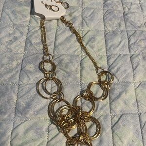 Goldtone necklace and earrings.